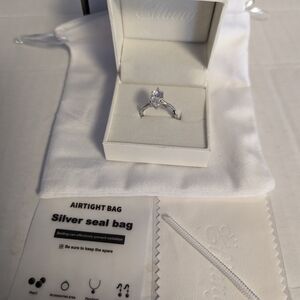 Elegant Silver Ring with Pear-Shaped Stone